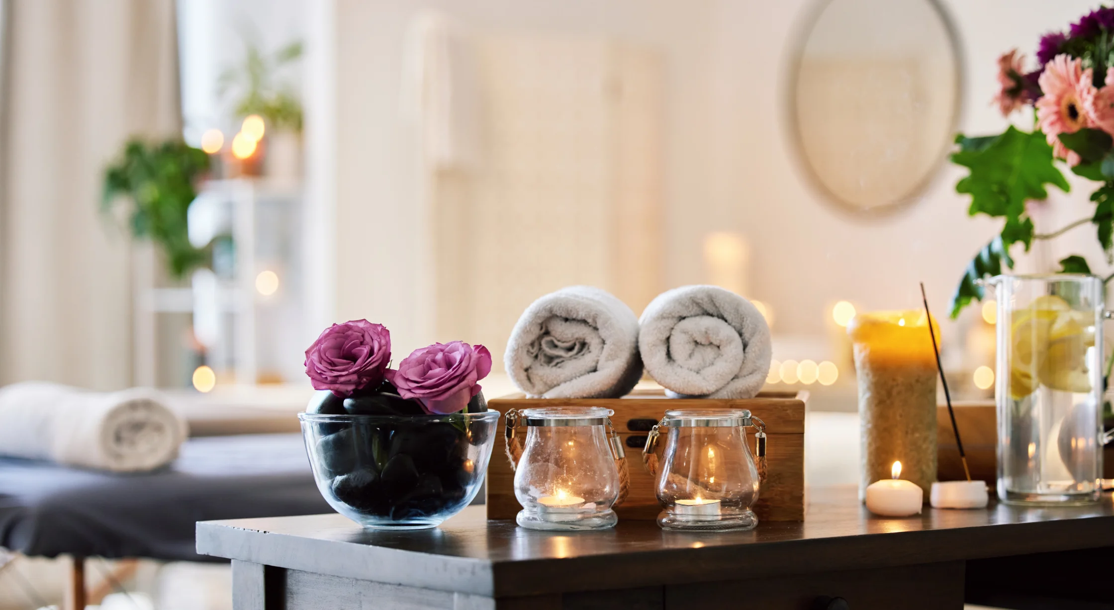 A luxury wellness room with candles at a spa resort.